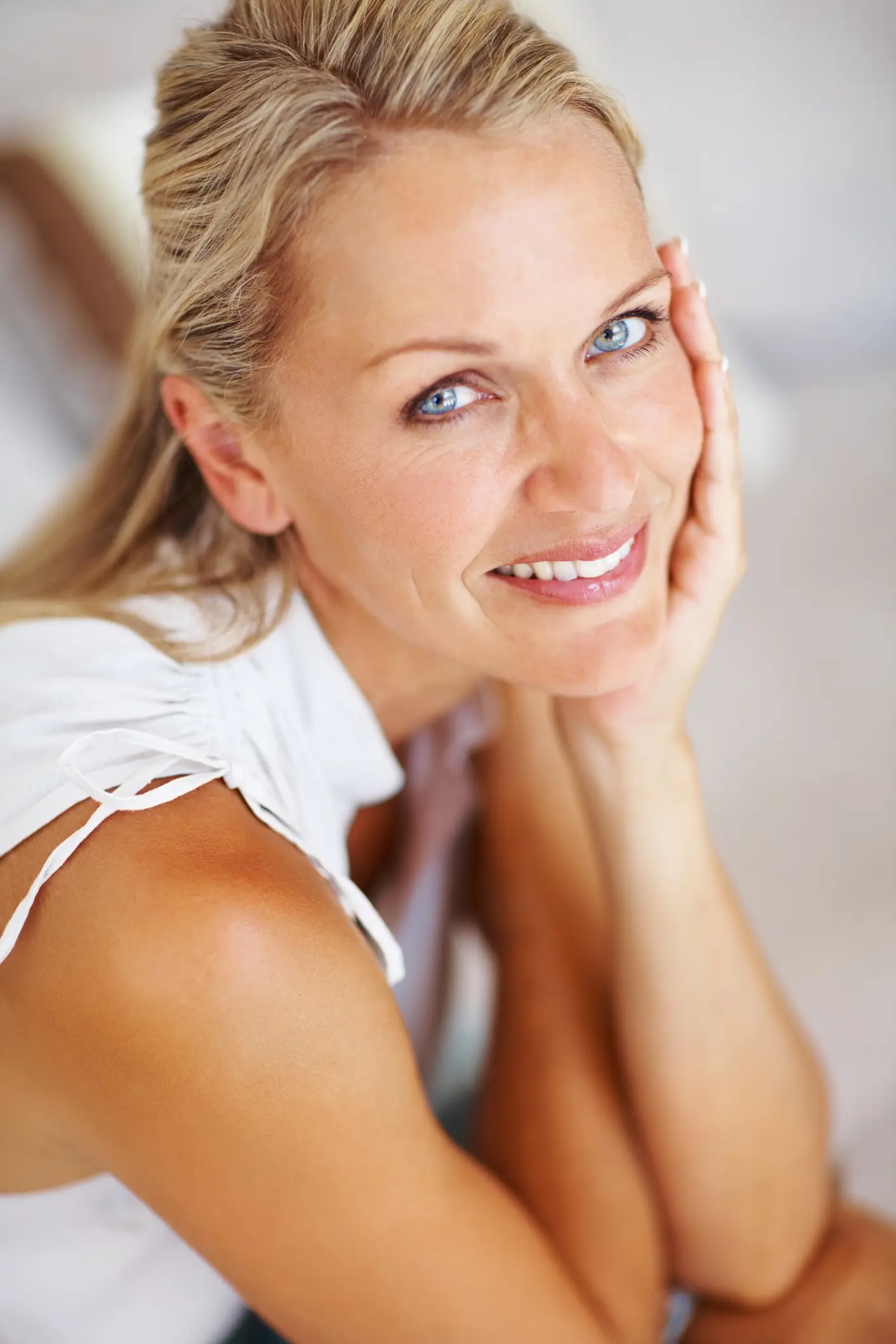 Close-up of a beautiful mature lady smiling Cosmetic Breast Surgery and Enhancement in Daytona Beach, FL