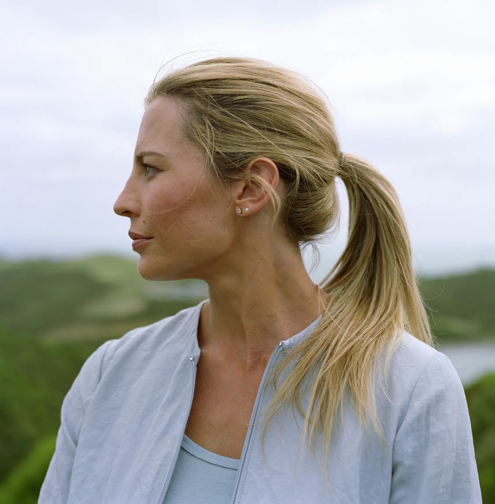 Woman outdoors, profile Cosmetic Breast Surgery and Enhancement in Daytona Beach, FL